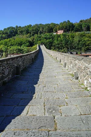 Maddalena bridge, called of the devil, in Borgo a Mozzano in Garfagnana, Tuscany, Italyの写真素材