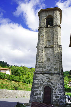 Bell tower of the church of San Donnino, hamlet of Piazza al Serchio in Garfagnana, Tuscany, Italyのeditorial素材