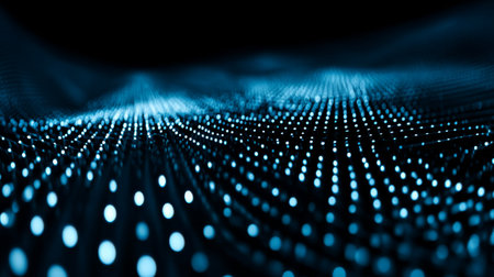 This image captures a stunning abstract representation of a blue digital landscape filled with glowing dots, symbolizing technology and data flows.の素材