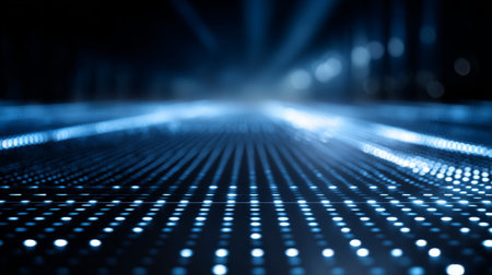 This mesmerizing image features a blue light pattern on a digital floor, creating an ethereal ambiance with glowing dots and soft bokeh effects.の素材