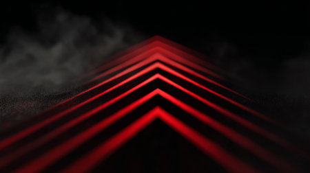 This abstract image features glowing red lines forming a striking geometric pattern against a dark background with a smoky effect, evoking modern creativity.の素材
