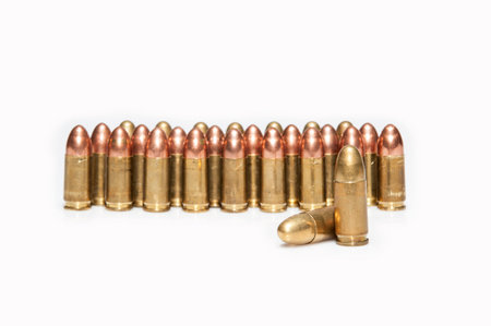 shell casings standing isolated on white background