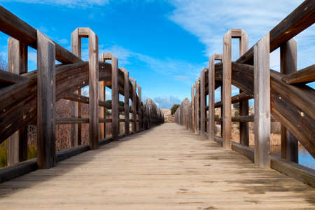 wooden bridge in HDR with blue skyの写真素材