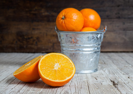 Oranges isolated cut set on wooden baseの写真素材