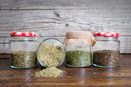 still life of different spices on rustic wood