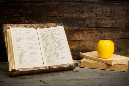 old books on old wood in retro styleの写真素材