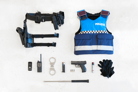 Police equipped with different material in the foregroundの写真素材