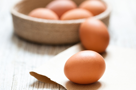 various chicken eggs on the inside of pot in the first focal planeの写真素材