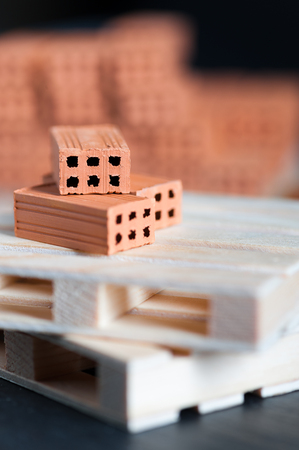 Clay bricks used for close-up miniature on black backgroundの写真素材