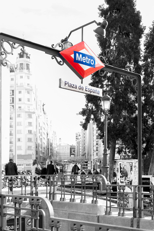 Black and white photography with color details of the subway entry in the capital of Spain, Madrid, taken on December 19, 2018のeditorial素材