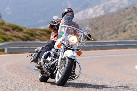 biker taking a bend with his bike. photograph captured on November 11, 2020 in the port of Navalmoral, Avila province, Spain.のeditorial素材