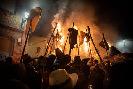 young people from the town of Mayorga, holding torches during the celebration of El Vitor, in Valladolid on September 27th as every year for the tradition of the saint Toribio.の写真素材