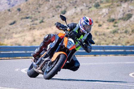 Motorcycle rider on the road.