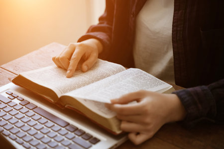 Read bible and pray with religious belief and god faith on blessing background. The power of hope or...
