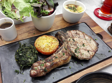 Delicious food steak Serve dishes on special plates.の写真素材