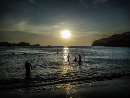 Enjoying the sunset from the best beachの写真素材