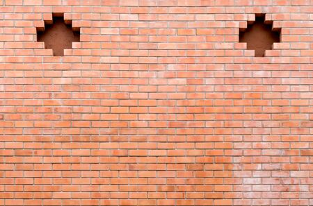 Old brown brick wallの写真素材