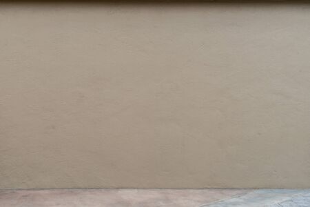 Brown concrete wall texture with concrete floorの写真素材