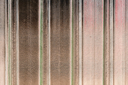Gray metal sheet wall with thermal insulation