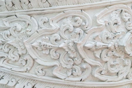 Thai ancient white concrete stucco in templeの写真素材