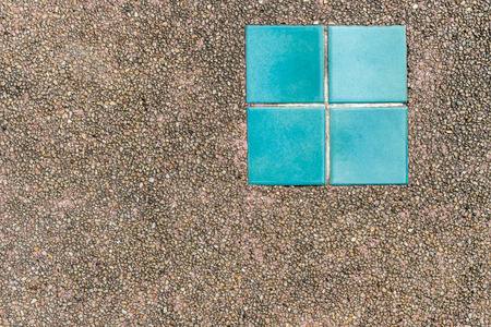 Concrete with small gravel texture with green blue tilesの写真素材
