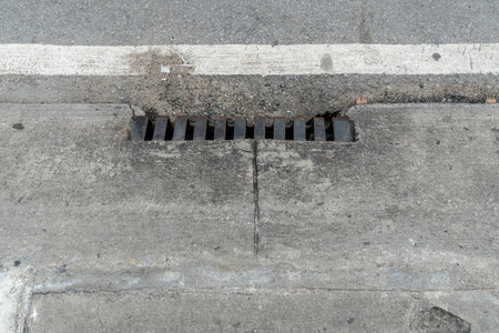 Rusty metal drain coverの写真素材