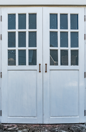 White wooden door with handleの写真素材
