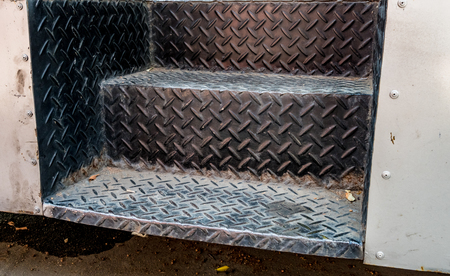 Rusty metal stair of old busの写真素材