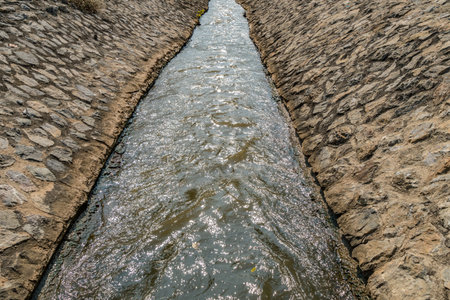 Irrigation canal with concrete stone wall