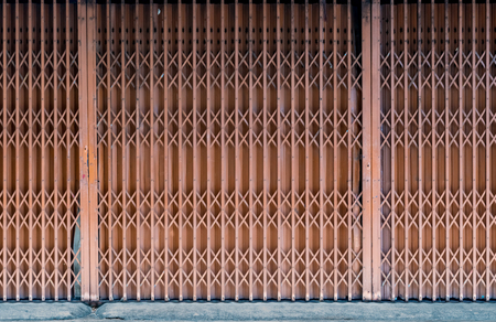 Rusty old style industry brown shutter gateの写真素材