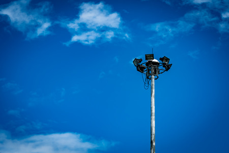 Spot light pole on blue skyの写真素材