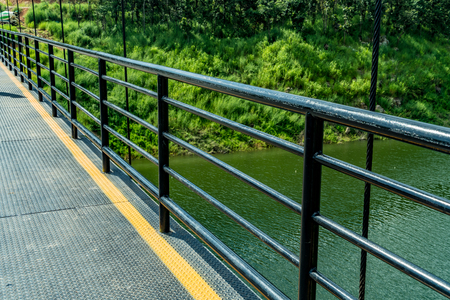 Black iron railing of bridgeの写真素材