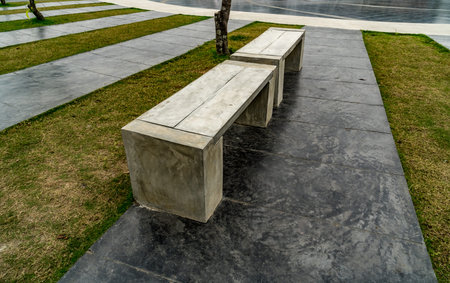 Gray Concrete bench on concrete floor in the park