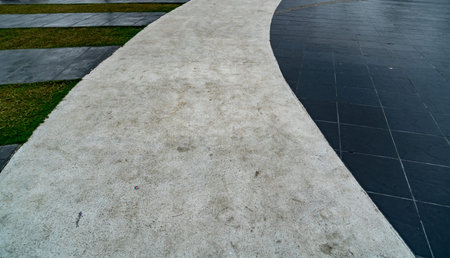 Curve concrete pathway in the park