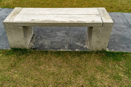 Gray Concrete bench on concrete floor in the parkの写真素材