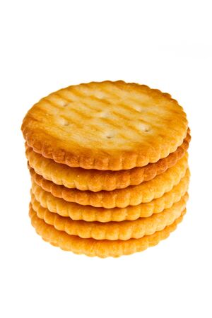 stacked of round biscuit on isolated whiteの写真素材