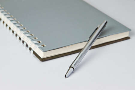 Pen on notebook in  business lookの写真素材