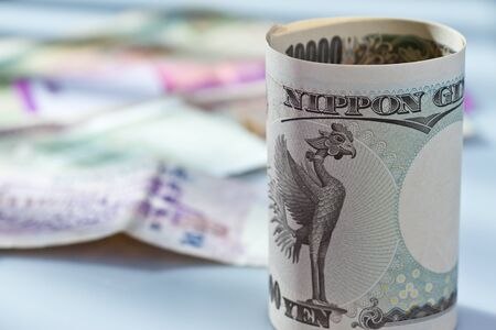 Rolled of multi national bank noteの写真素材