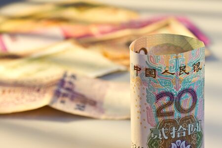 China Yuan in front of multi national bank noteの写真素材