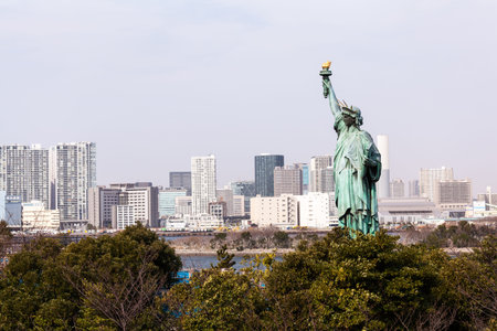 Statue of Liberty and Tokyo Skyscrapers view from Odaiba, Japan