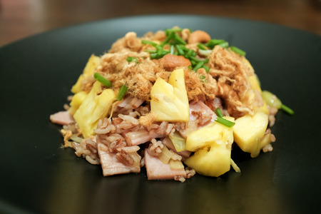 Fried rice with pineapple on the tableの写真素材