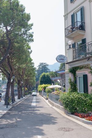 BELLAGIO, ITALY - JULY 5 2015: Tourists walking at Bellagio street,  Bellagio, Italy. Shopping street at Bellagio, Como lakeのeditorial素材
