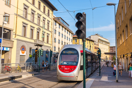 Florence, Italy - July 12, 2015: Tram in the city of Florence passing by Firenze Stazioeのeditorial素材