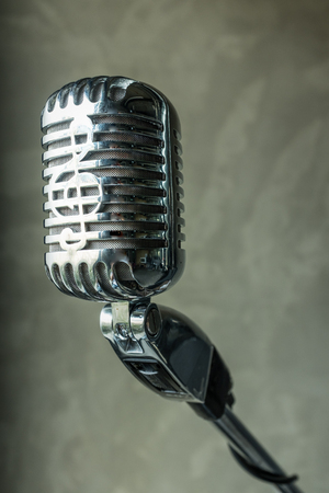Vintage microphone on grey backgroundの写真素材