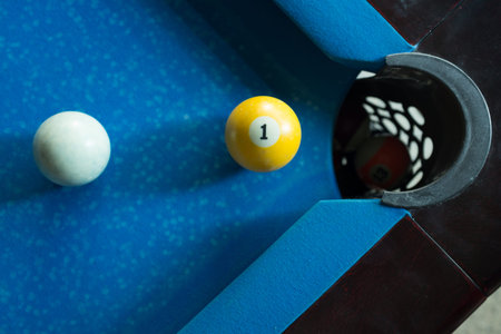 Sport billiard balls on blue billiard table