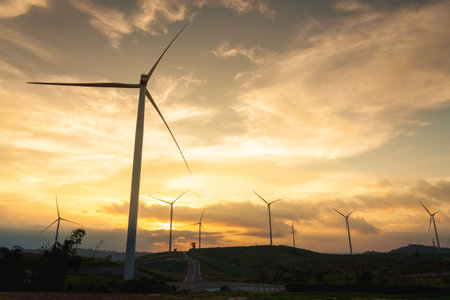 Silhouette of wind Turbine in sunset mood, Pitsanulook, Northern of Thailand