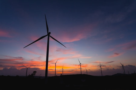 Silhouette of wind Turbine in sunset mood, Pitsanulook, Northern of Thailand