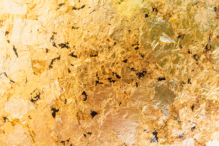 Close up gold background or texture and gradients shadowの写真素材