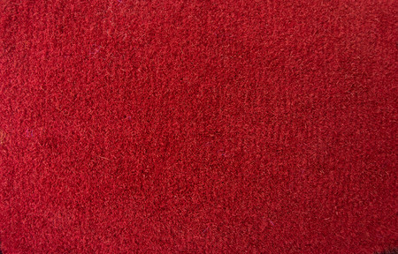 red fabric fluffy machine Shoe rug with pile textured pattern textured collection otherreferats concept background fabric businessの写真素材