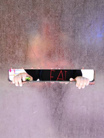 A small child looking out the gap of craft boxの写真素材